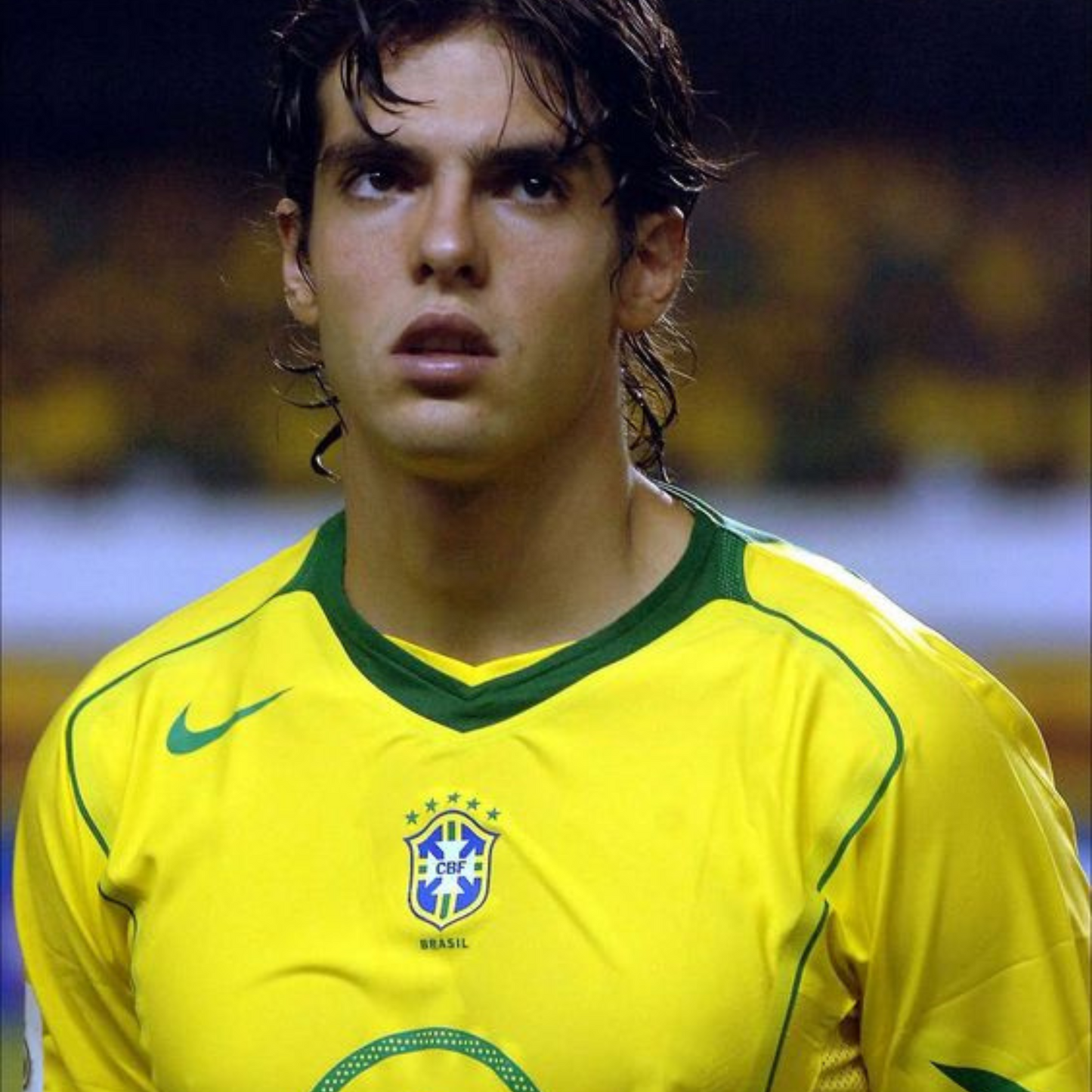 Portrait of a Kaká wearing the 2004 Copa America Retro Brazil Home Retro Soccer Jersey2004 Brazil Jersey - Brazil Retro Soccer Jersey 2004 | MuchoGoal Kits